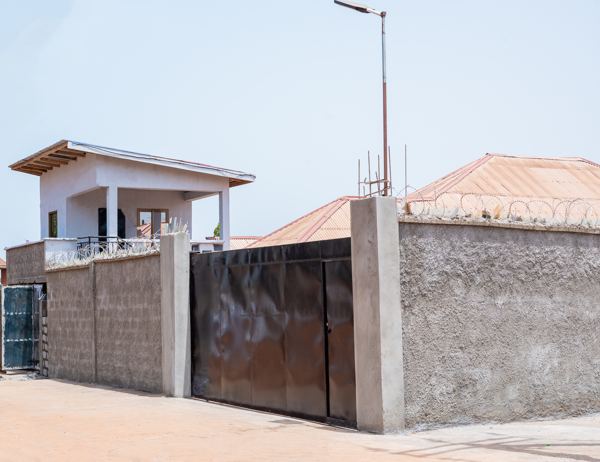 Vehicle gate and secured perimeter wall